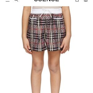 Kid 12y Burberry shorts but also fit women’s xs-s . Worn once for an hour